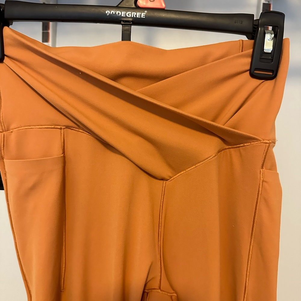 Orange American eagle leggings.